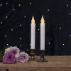 2 LED flame candles with their candlesticks