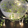 Grüne Perlen-LED-Girlande auf Batterien