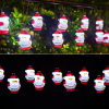 Ghirlanda solare con 10 Babbi Natale luminosi