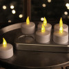 Set di 6 candele LED ricaricabili e relativa stazione di ricarica